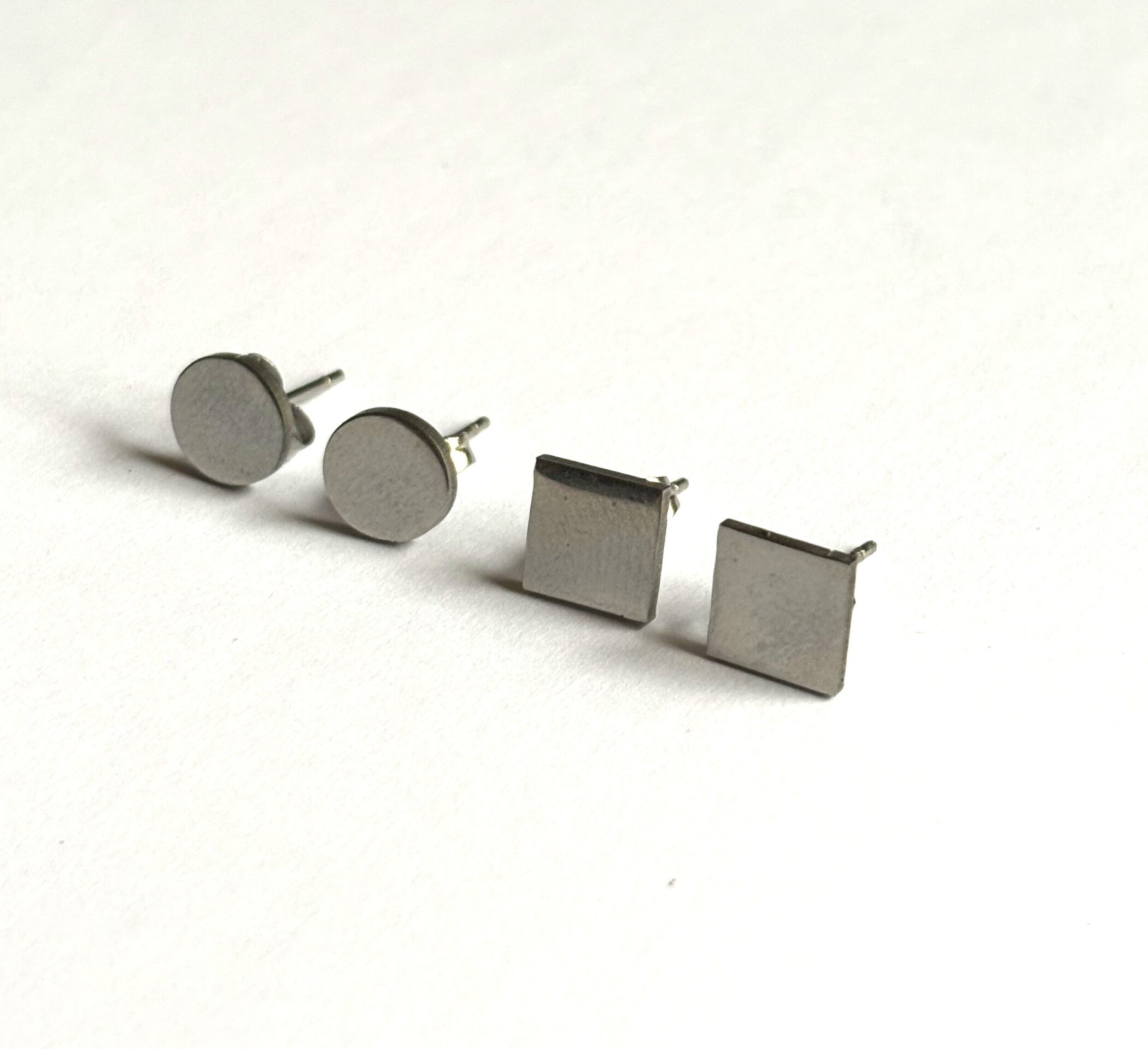 pendientes pegados acero inoxidable - 1