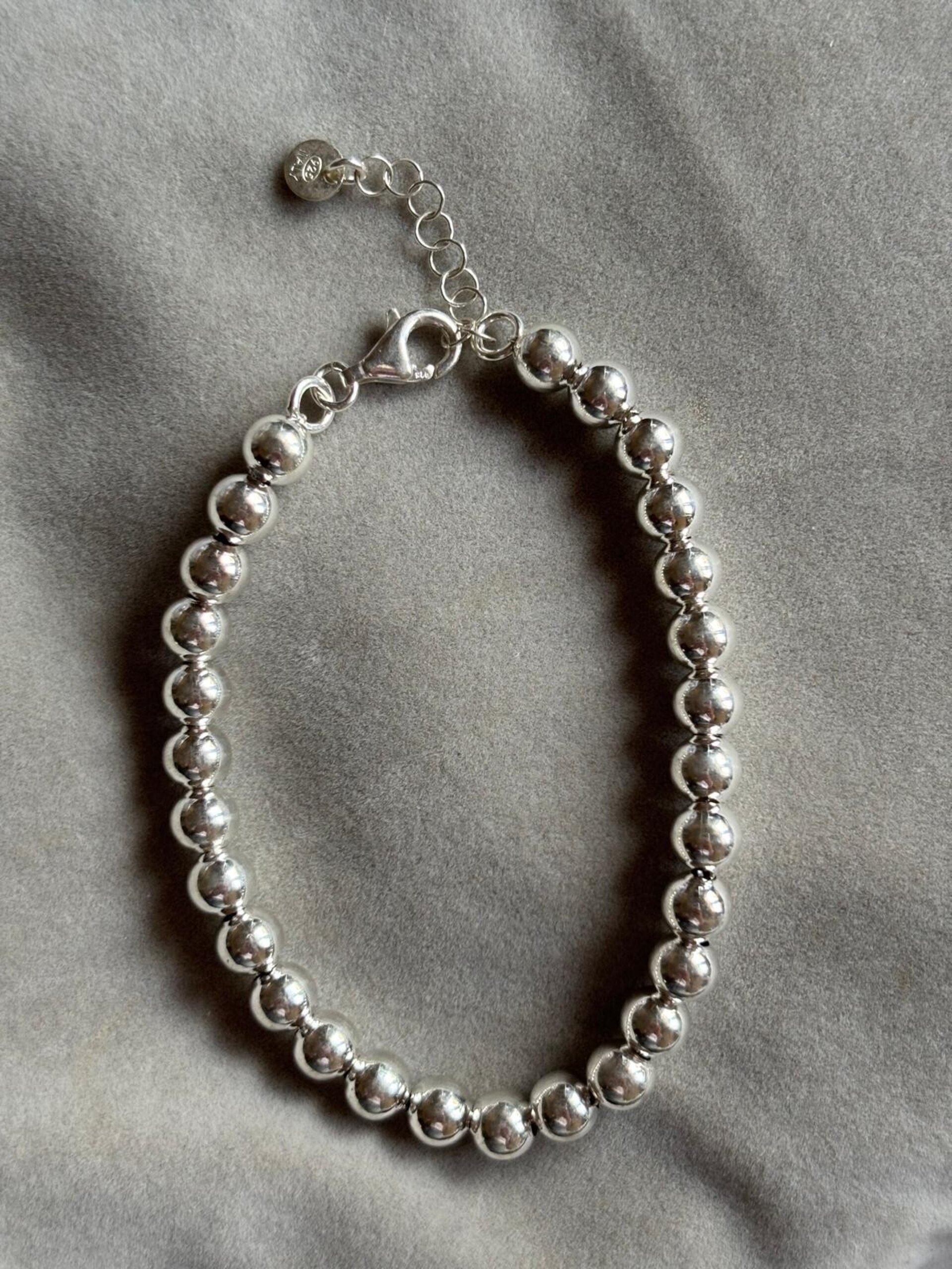 pulsera bolas 6mm ajustable - 1
