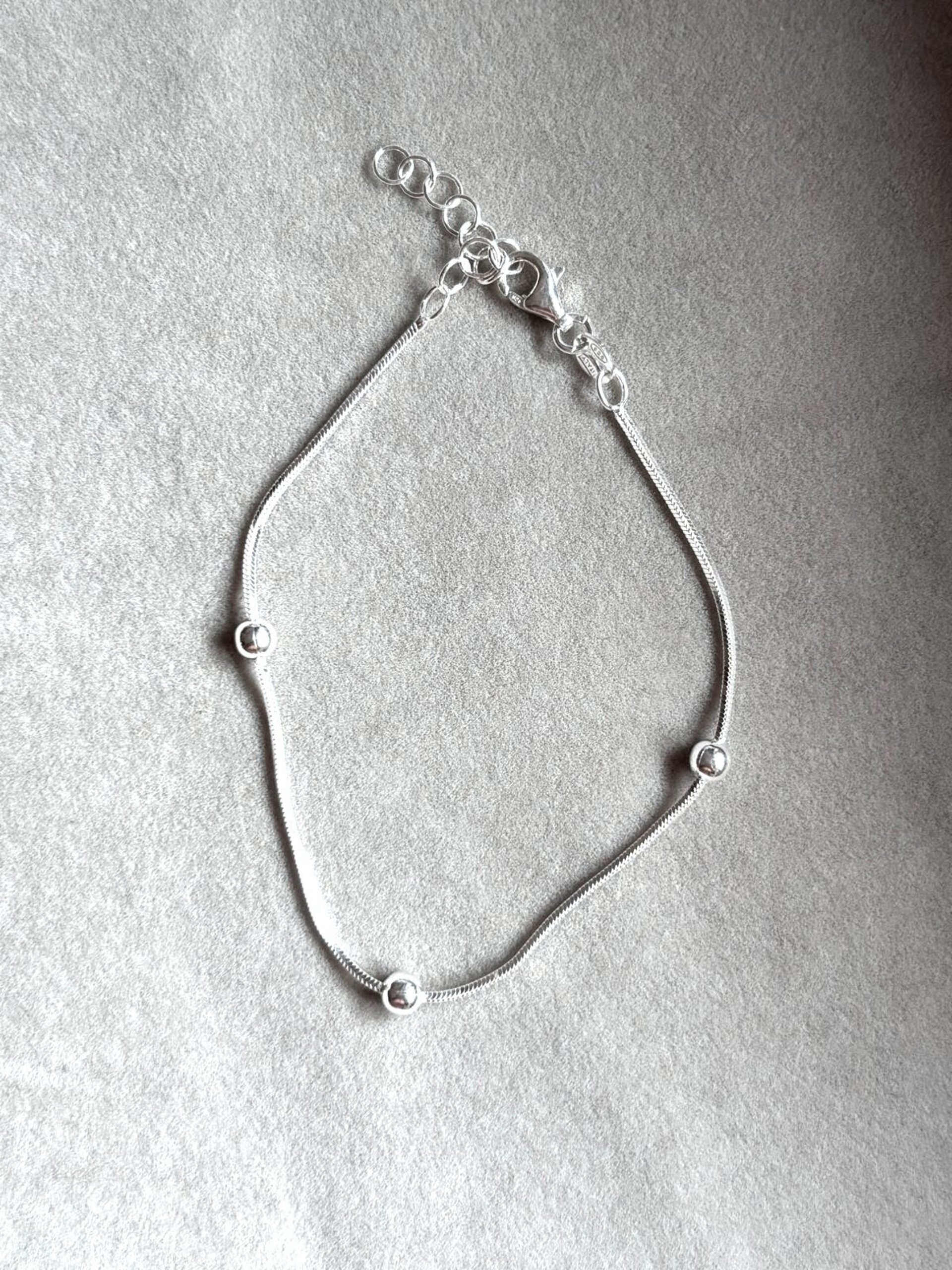 pulsera cola de ratón y bolas - 1